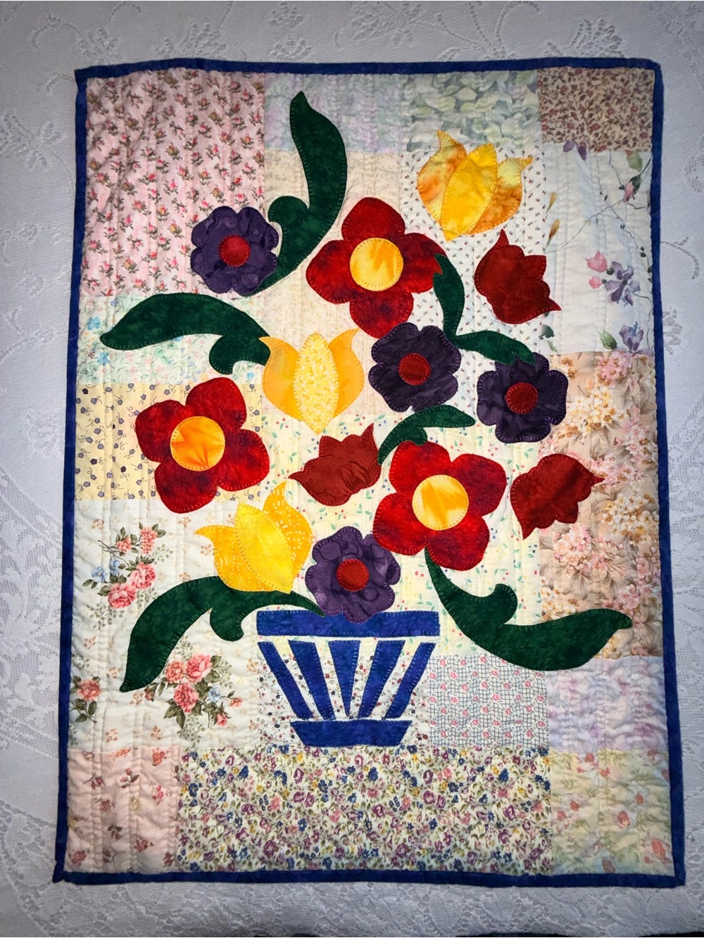 Handmade Floral Appliqué Wall Quilt in Red, Yellow, Purple, and Green